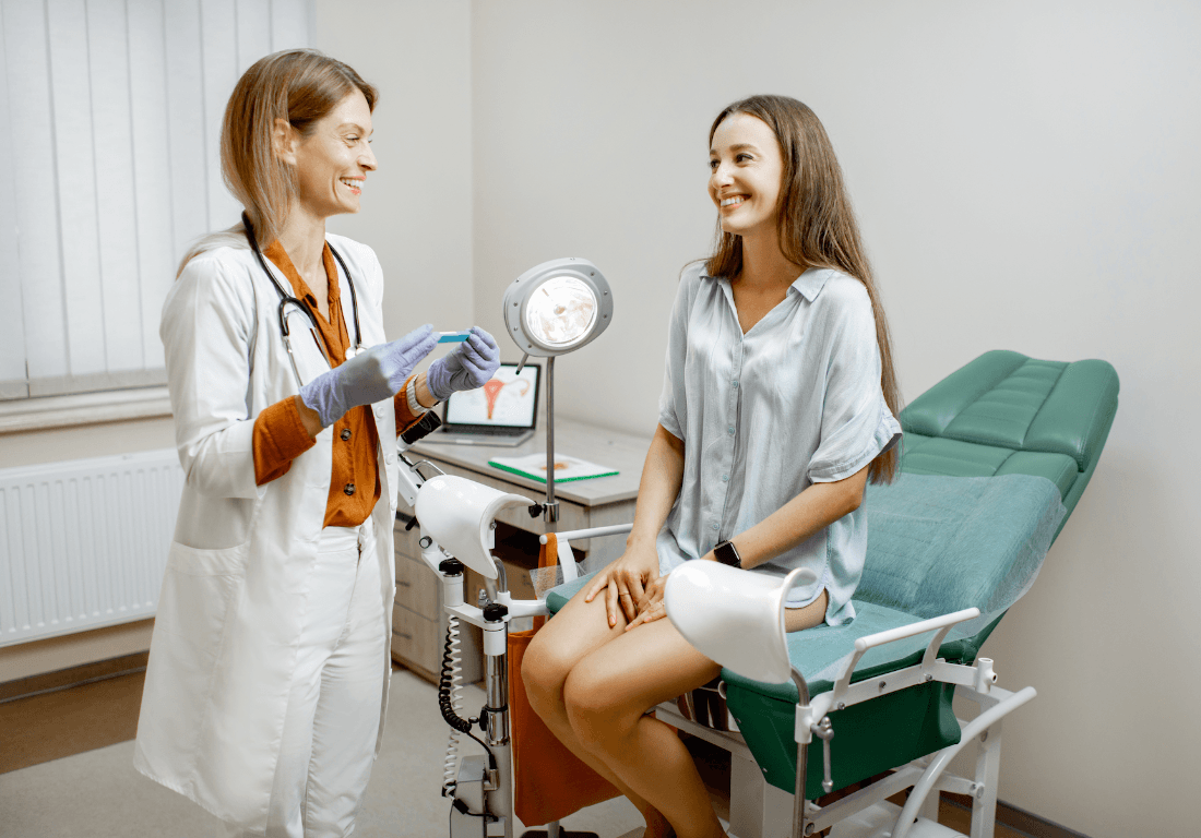 Female Gynecologist Smiling At Her Patient